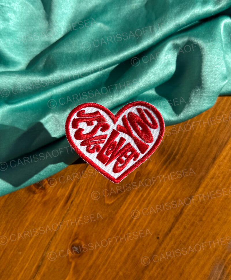 white & red jesus loves you iron on patch