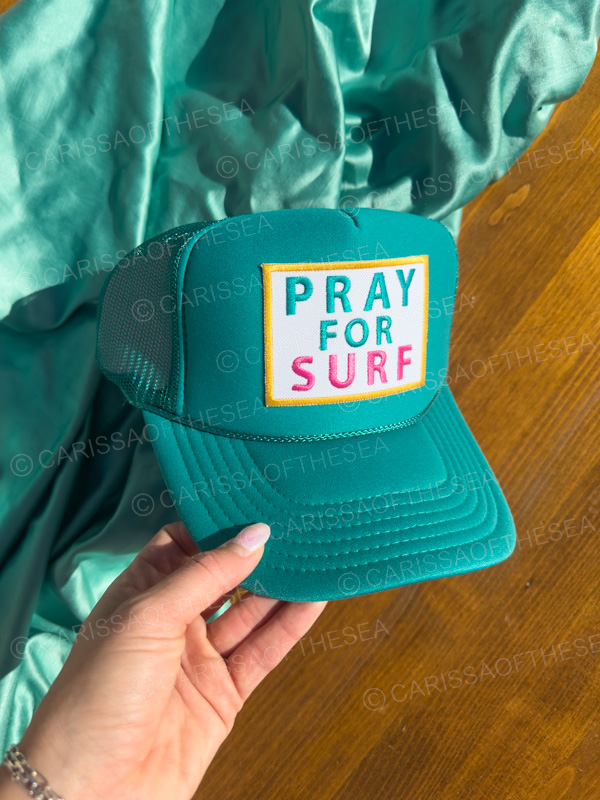pray for surf pink or teal trucker hat