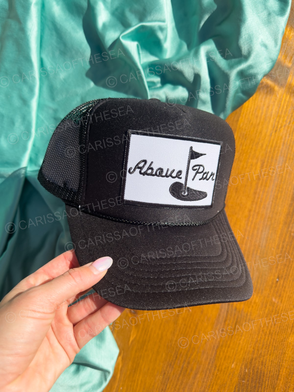 above par black trucker hat