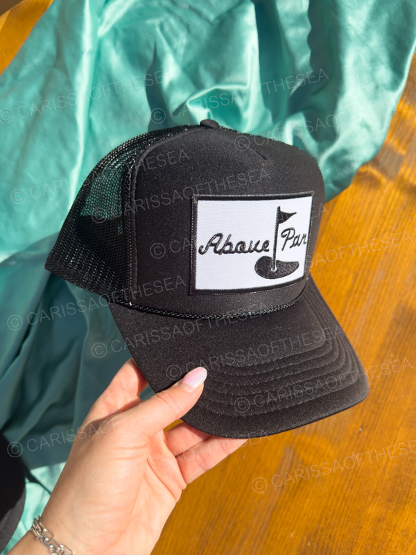 above par black trucker hat