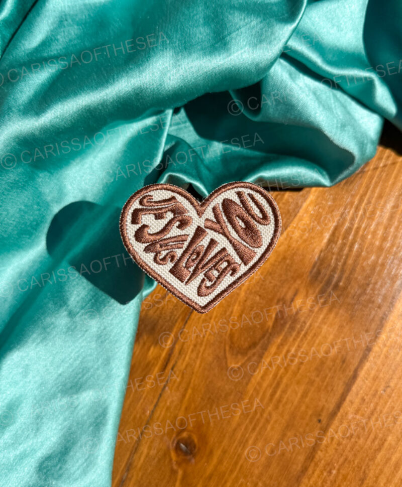 brown jesus loves you heart iron on patch