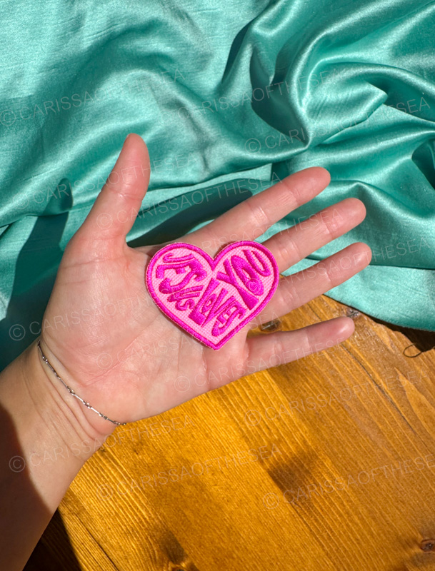hot pink jesus loves you heart iron-on patch
