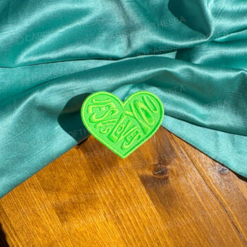 lime green jesus loves you heart iron-on patch